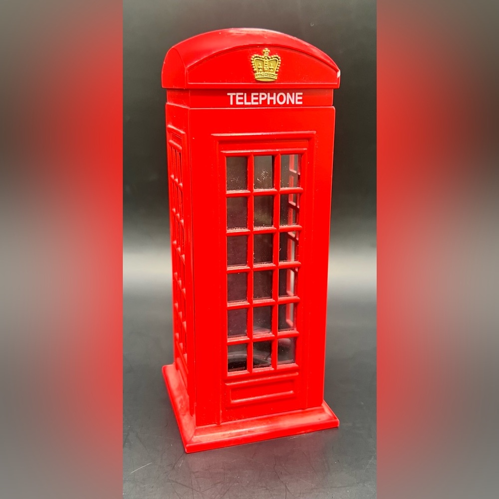 Red Telephone Booth Coin Bank- Pre-Owned, Metal with plastic plug.